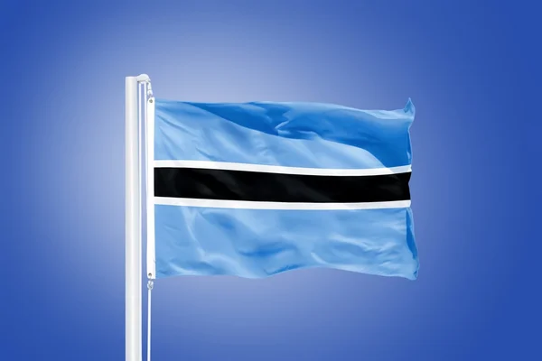 Flagge Botswanas weht vor blauem Himmel — Stockfoto