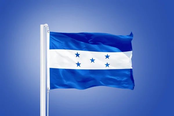 Bandeira de Honduras voando contra um céu azul — Fotografia de Stock