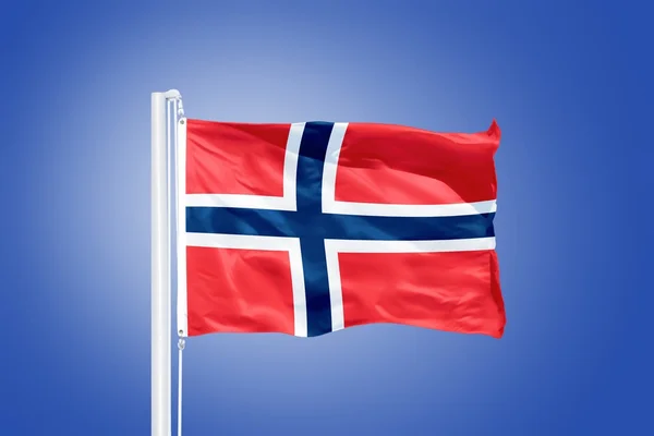 Flag of Norway flying against a blue sky — Stock Photo, Image