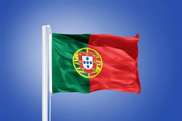 Flag of Portugal flying against a blue sky — Stock Photo, Image