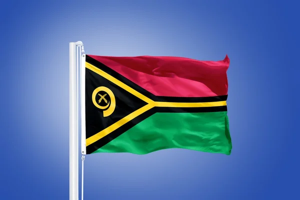 Vlajka Vanuatu létal proti modré obloze — Stock fotografie