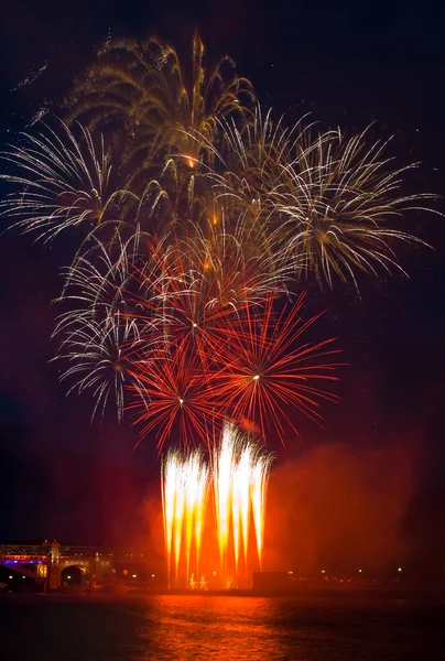 Colorful festival fireworks at the river — Stock Photo, Image