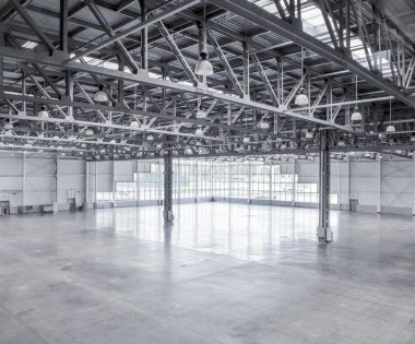 Interior of an empty warehouse clipart