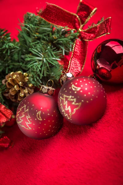 Red christmas ball on red background — Stock Photo, Image