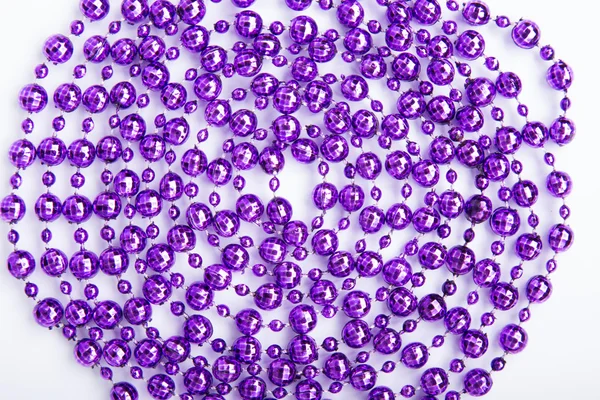 Purple beads garland isolated on white — Stock Photo, Image