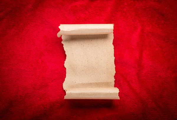 Old vintage scroll on red background — Stock Photo, Image