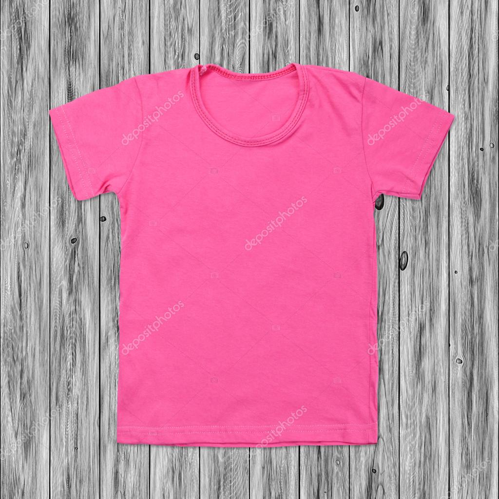 Pink Tshirt On A White Wooden Background Stock Photo - Download