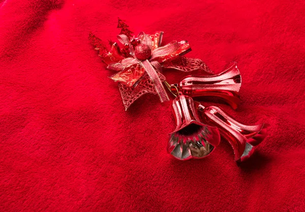 Xmas bells on red background — Stock Photo, Image