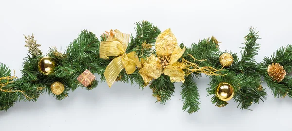 Christmas fir tree branch with golden decoration — Stock Photo, Image