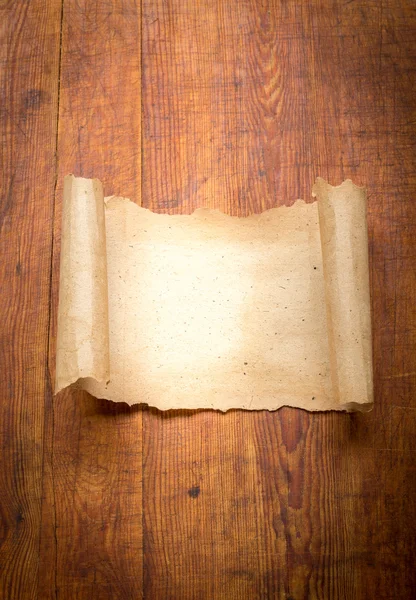 Close up of grunge note paper on wood — Stock Photo, Image