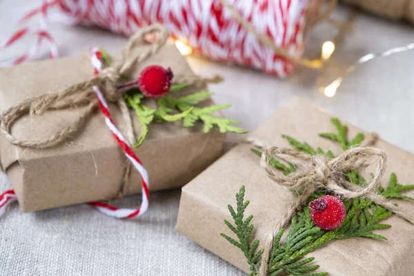 New Year\'s gifts in craft packaging. Christmas and New Year holidays background, selective focus