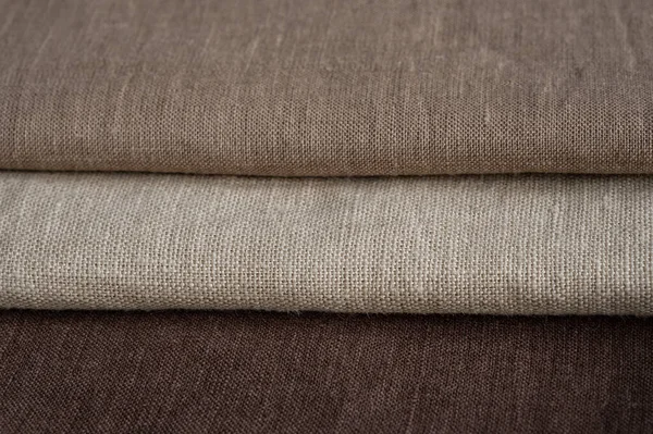 Brown linen pattern texture background. Stripes of fabric. Natural linen texture as background