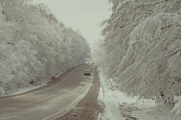 En snöig väg — Stockfoto