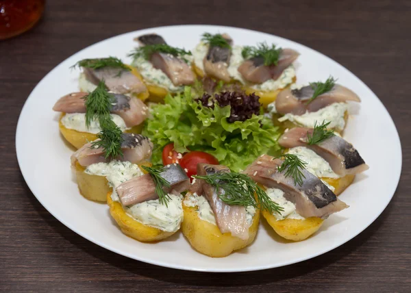 Snack with herring and potato — Stock Photo, Image