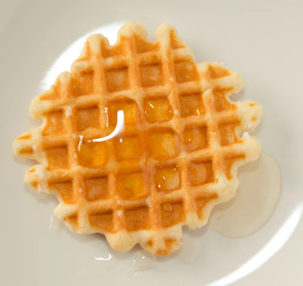 Waffles with honey — Stock Photo, Image