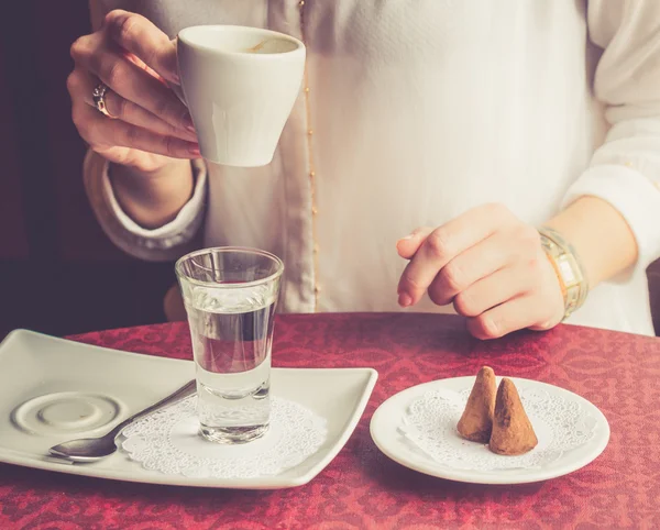 Ristretto coffee and glass of water — Stock Photo, Image