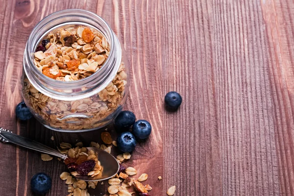 Homemade granola in a jar — Stock Photo, Image