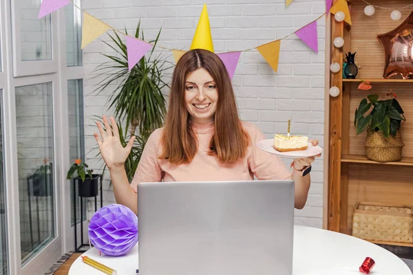 Woman celebrating birthday at home and communicate by video chat — Stock Photo, Image