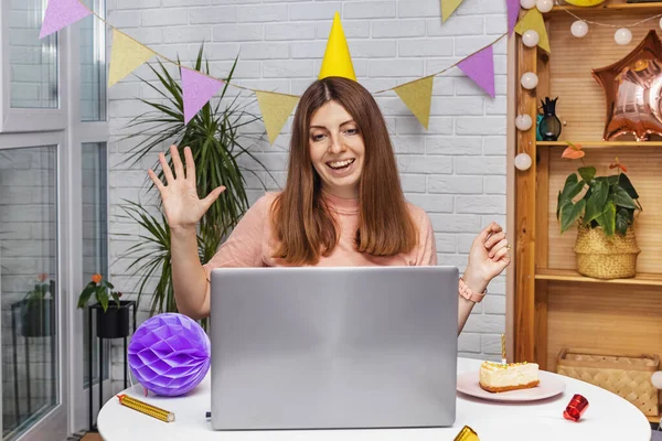 Woman celebrating birthday at home and communicate by video chat — Stock Photo, Image