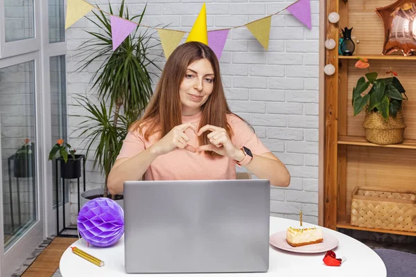 Woman celebrating birthday at home and communicate by video chat — Stock Photo, Image