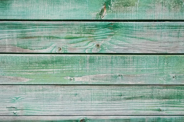 Shabby mint colored wooden background