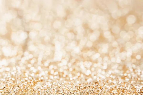 Gold Festive Christmas background with blurred lights — Stock Photo, Image