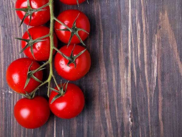 Brunch of red cherry tomatoes — Stock Photo, Image