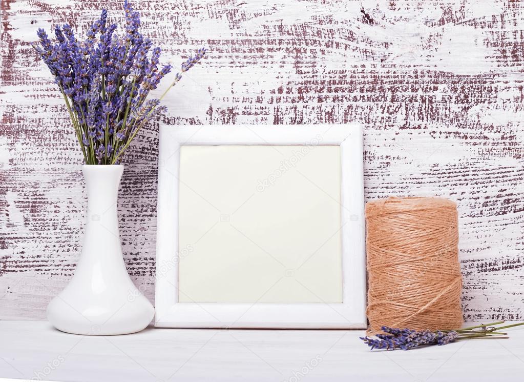 White empty frame with place for text and lavender flowers. 