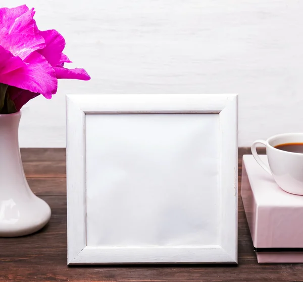 White empty frame with place for text on the table — Stock Photo, Image