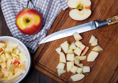 Cutted apples on the wooden board