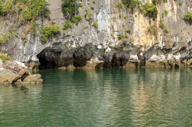 mountain limestone islands landscape in Ha Long Bay, Vietnam clipart