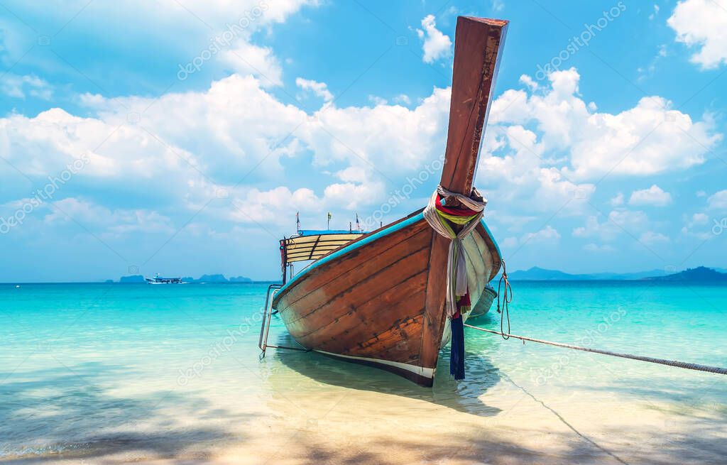Beach view longtail boat Turquoise Blue Water Thailand Andaman Sea