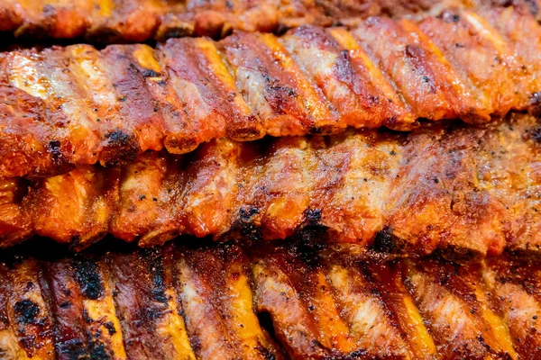 Carne de porco assada na grelha de perto — Fotografia de Stock