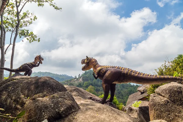 Dinosaur in moutains — Stock Photo, Image