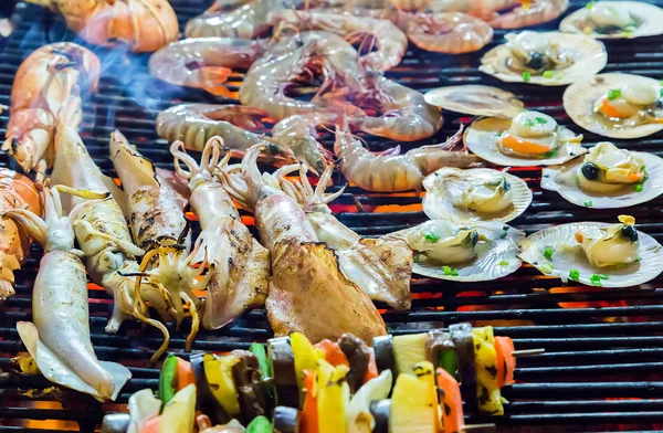 Barbecue Grill cooking seafood. — Stock Image Barbecue Grill cooking seafood. Royalty Free Stock Photos