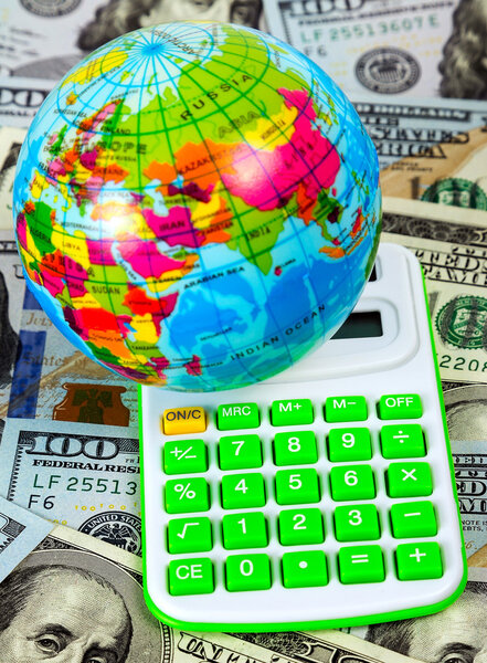 globe in calculate on US dollar bill