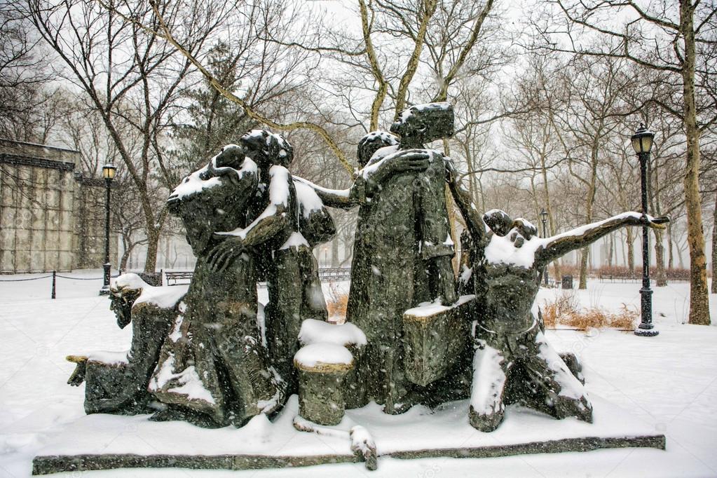 NEY YORK - January 21:Visitors at the Immigrants - Sculpture At 