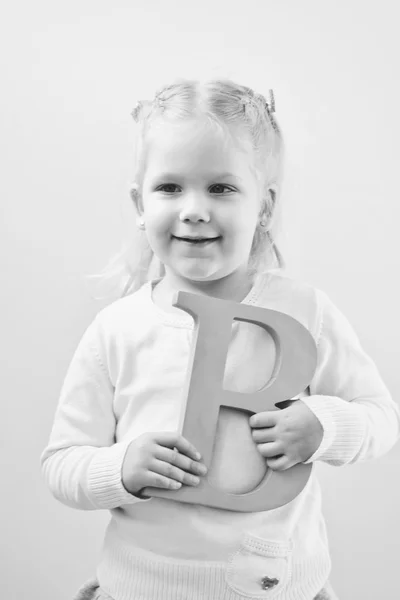 Toddler girl  with letter — Stock Photo, Image