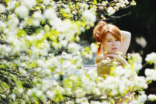 Redhead young woman in spring — Stock Photo, Image