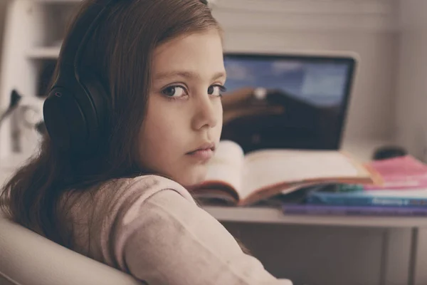 Preteen Schoolgirl Doing Her Homework Laptop Computer Home Child Using Royalty Free Stock Photos