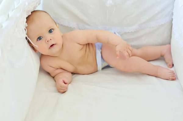 Baby in the crib — Stock Photo, Image