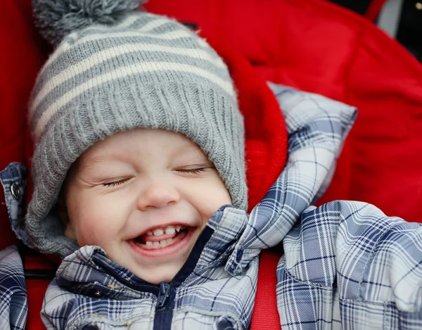 Happy boy in stroller — Stock Photo, Image