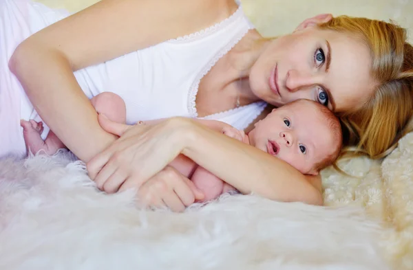 Woman with newborn — Stock Photo, Image