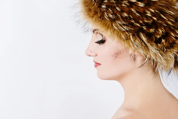 Woman is wearing fur hat — Stock Photo, Image