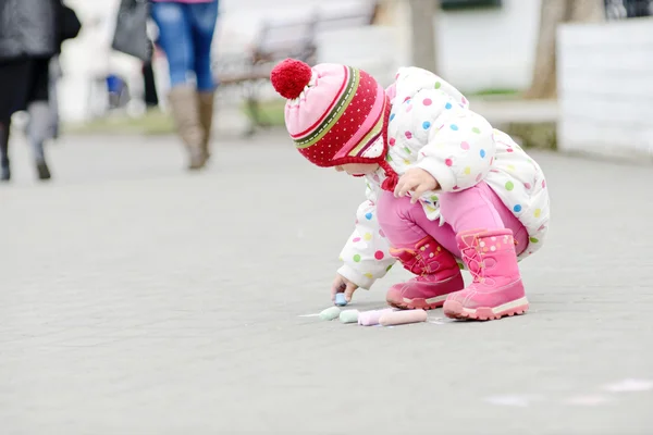 Toddler girl with chalk — Stock Photo, Image