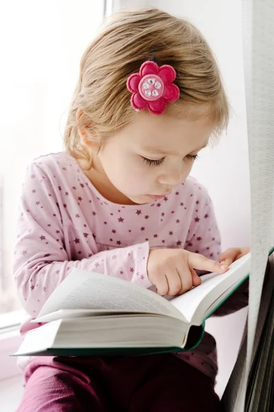 Toddler with book — Stock Photo, Image