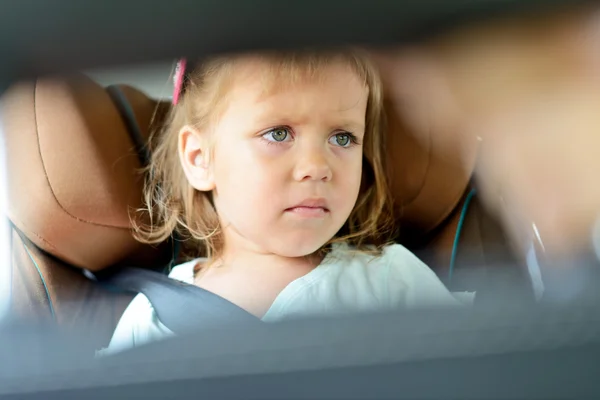 Sad girl in car — Stock Photo, Image