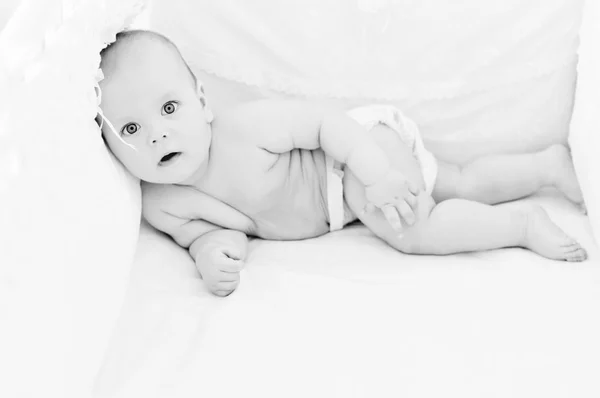 Resting baby in the bed — Stock Photo, Image