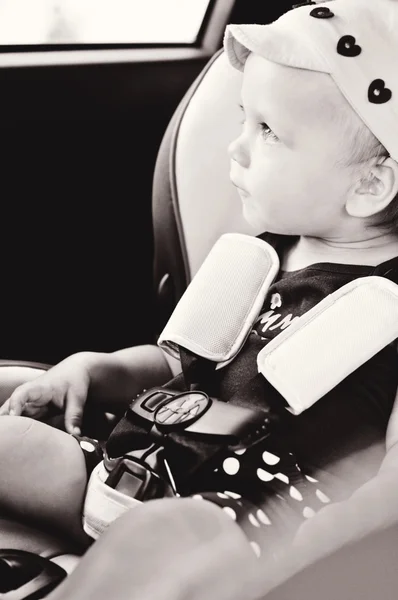 Baby in a safety car seat — Stock Photo, Image