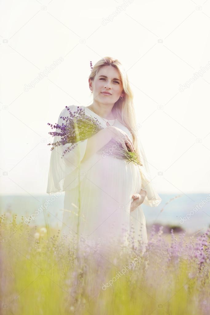pregnant woman in a lavender field